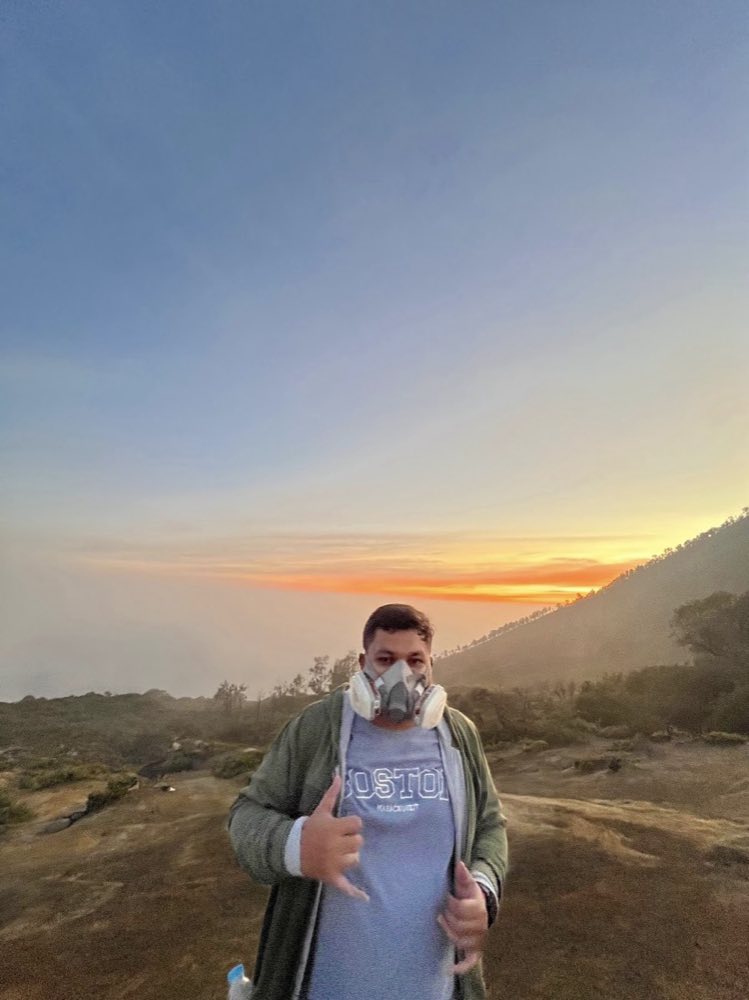 Wearing a respirator mask at sunrise on Mt. Ijen